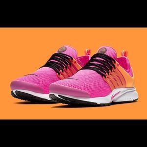 Pink and orange Nike presto sneakers